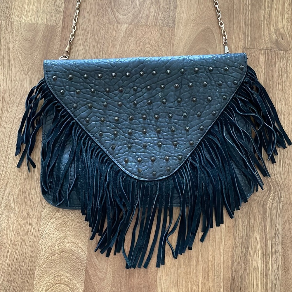 Black studded clutch